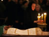 A casket of late Patriarch Alexy's body is placed for public viewing in Moscow's Christ the Saviour Cathedral December 7, 2008. Russian Orthodox Christians flocked to pay tribute to Patriarch Alexiy II on Sunday as he lay in state in a Moscow cathedral, thanking him for the revival of the faith after decades of communist repression. Alexiy II, enthroned in 1990 a year before the demise of the Soviet Union, died of heart failure on Friday. He was 79. (From Reuters Pictures by REUTERS)